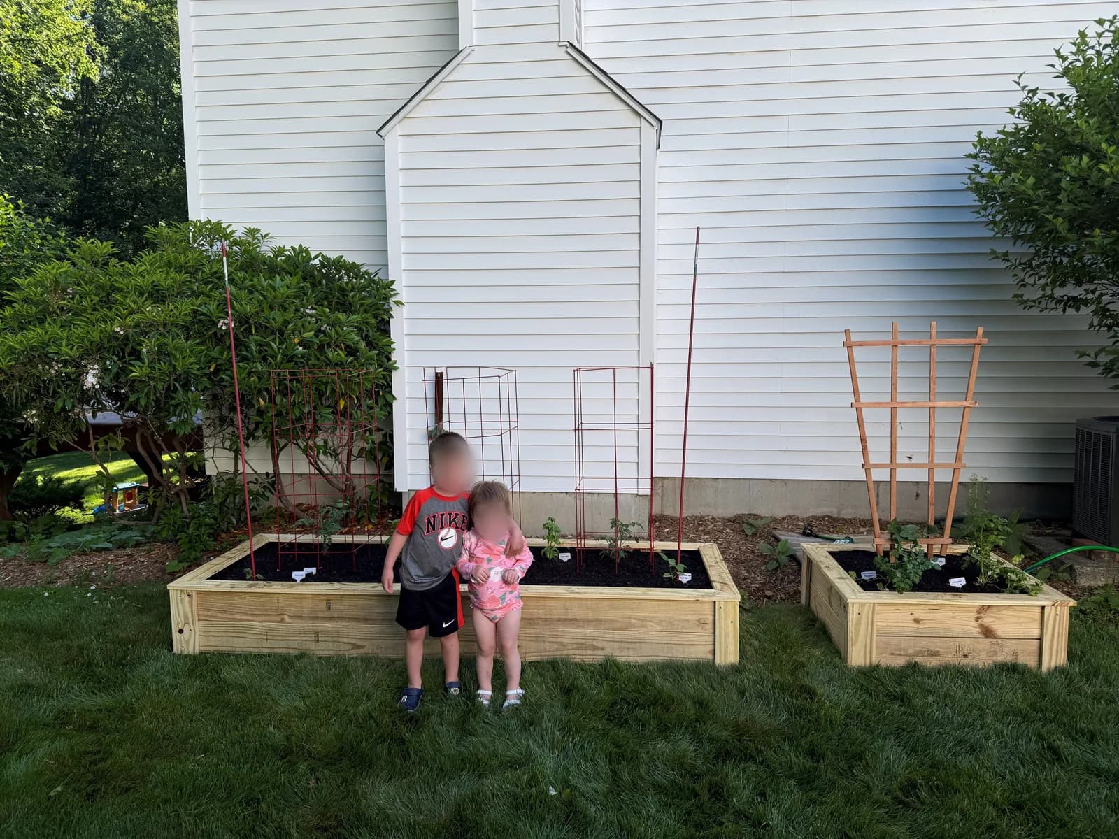 Stephen in a garden he built